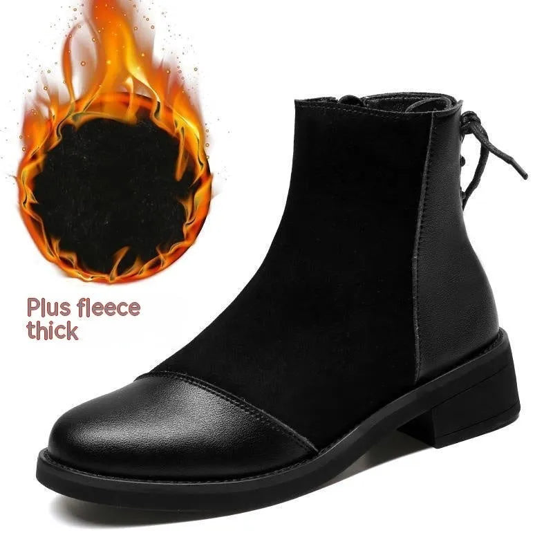 Black women's Martin boots with side zip, round toe, and short stout heel
