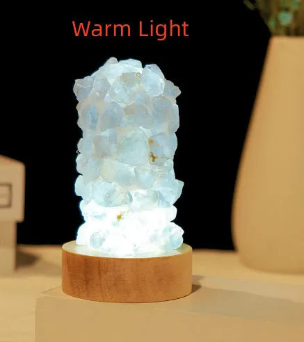 Natural amethyst vug tooth flower mini night light USB plug-in crystal lamp with warm light option on a wooden surface