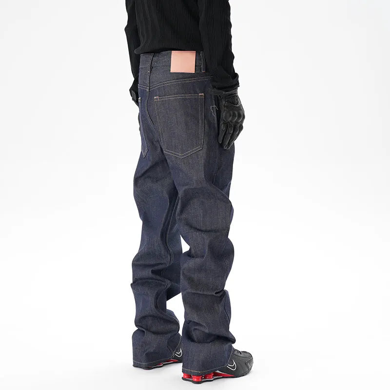 Casual loose straight original jeans in dark blue denim fabric, front view, showing loose straight leg cut.