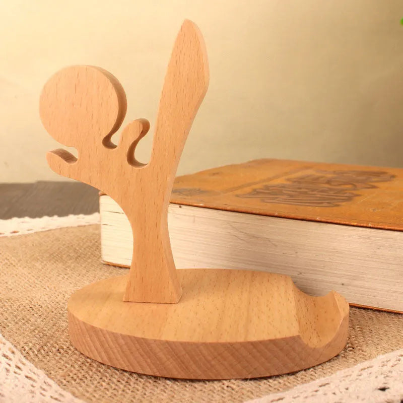 Beech wood mobile phone holder with resin animal design and coin slot