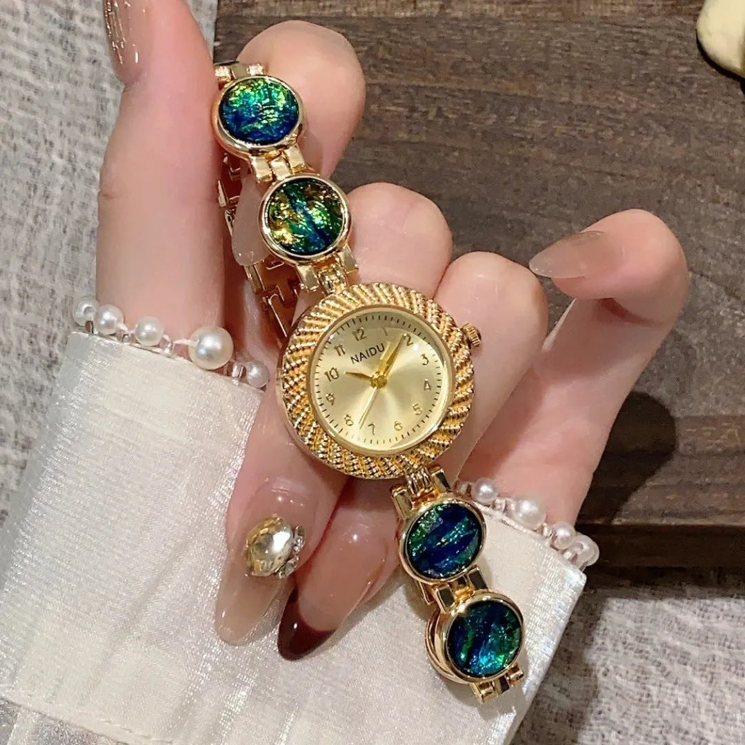 Women's round dial quartz watch in milky white with zinc alloy case and spiral crown.