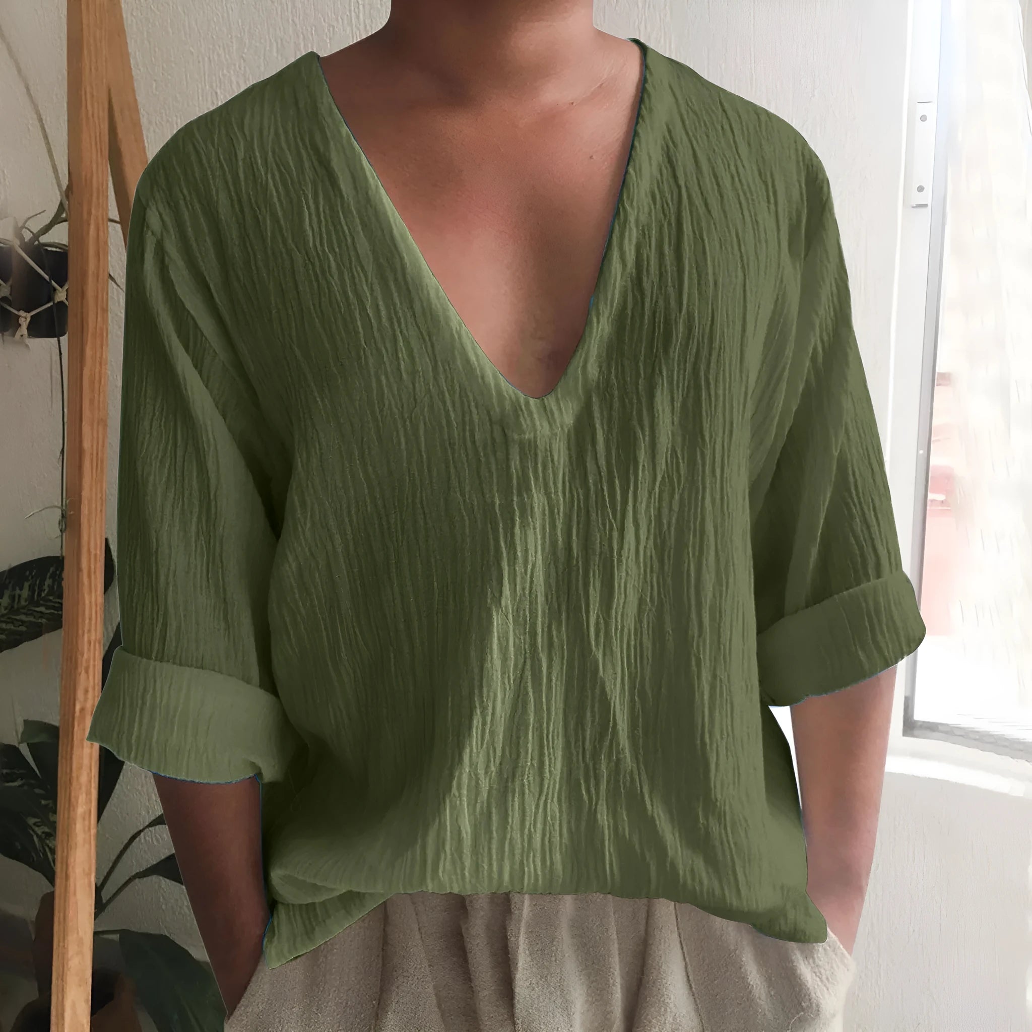 Men's long sleeve V-neck T-shirt in washed cotton linen blend fabric in solid colour options.