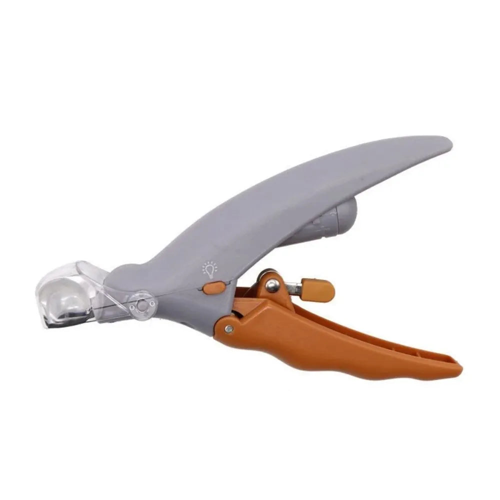 Yellow pet nail clipper with LED light, magnifying lens, and non-slip handle for dogs and cats.