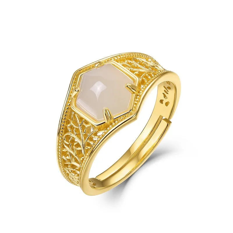 Silver hexagon geometric ring with 10k gold swimming paint finish and adjustable opening for women