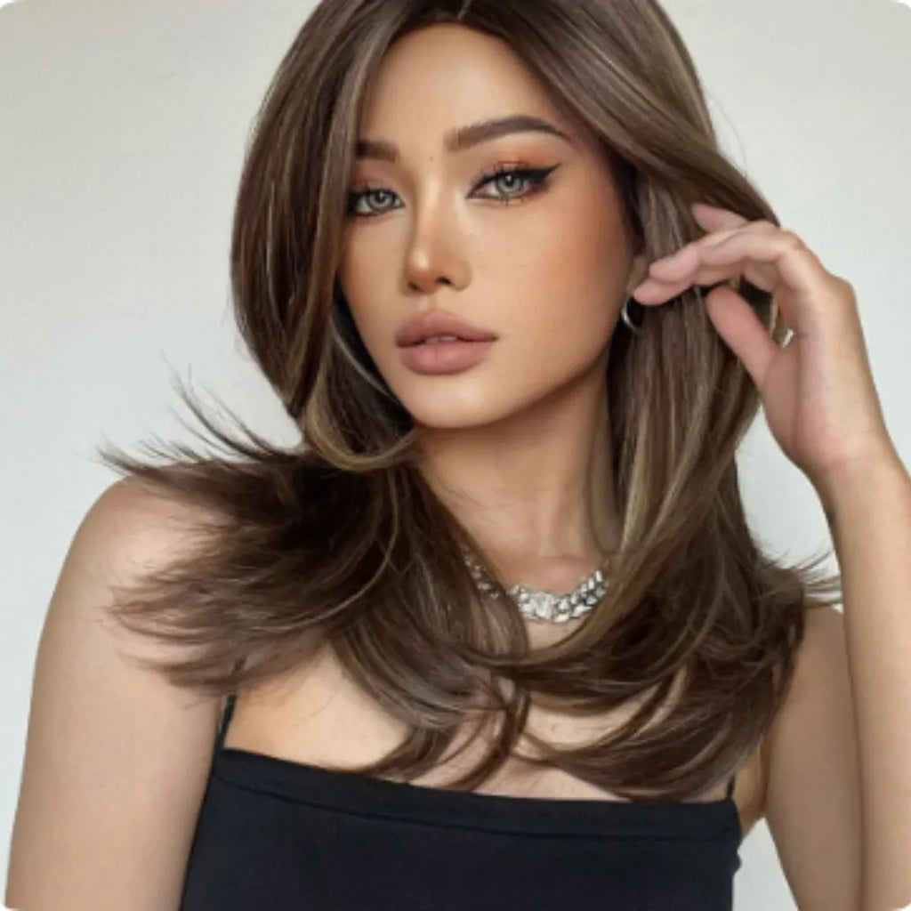 Mid-length curly synthetic wig with platinum gradient colours and bangs