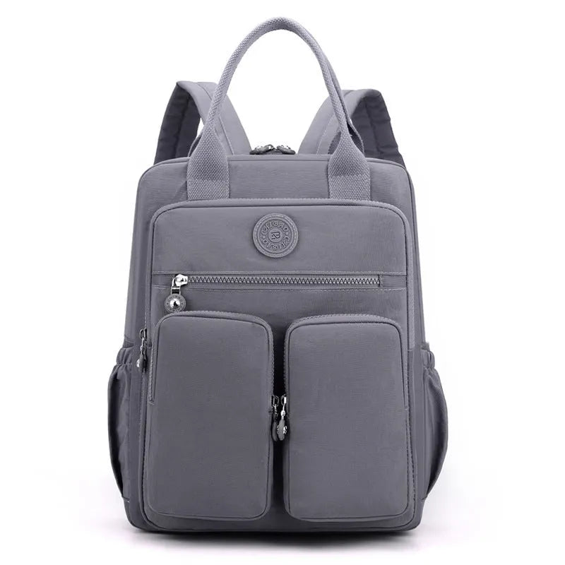 Waterproof travel backpack for women, large capacity, nylon material, multiple pockets, colour options