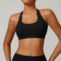 Women's halter sports bra in nylon with removable pads in black, red, purple, brown, or blue