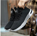 Men's casual shoes in mesh material, shown in one of six available solid colours.