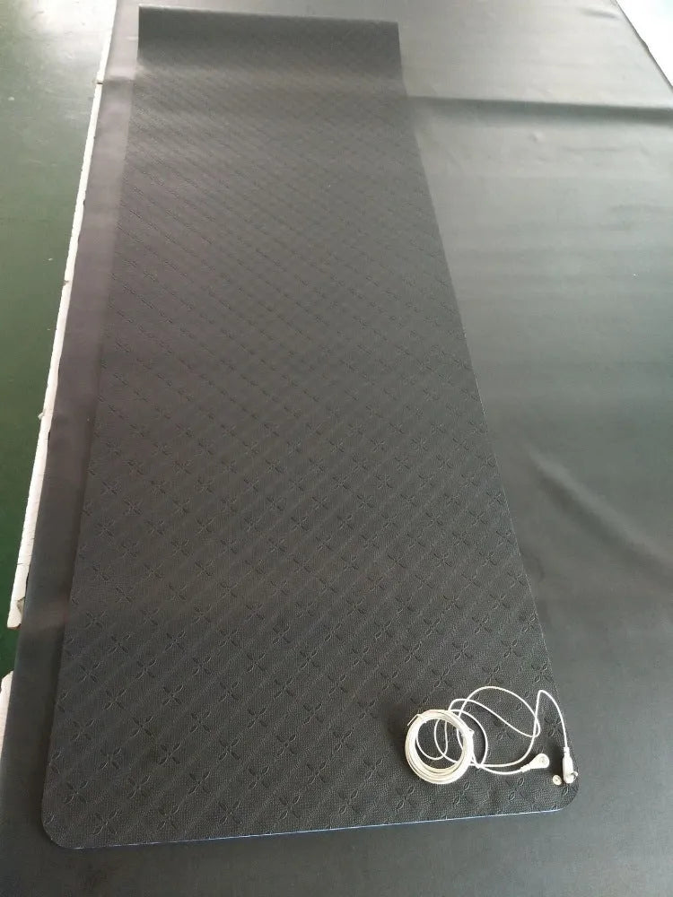 Blue conductive grounding yoga mat with plant pattern, showing integrated wire and 182cm length.