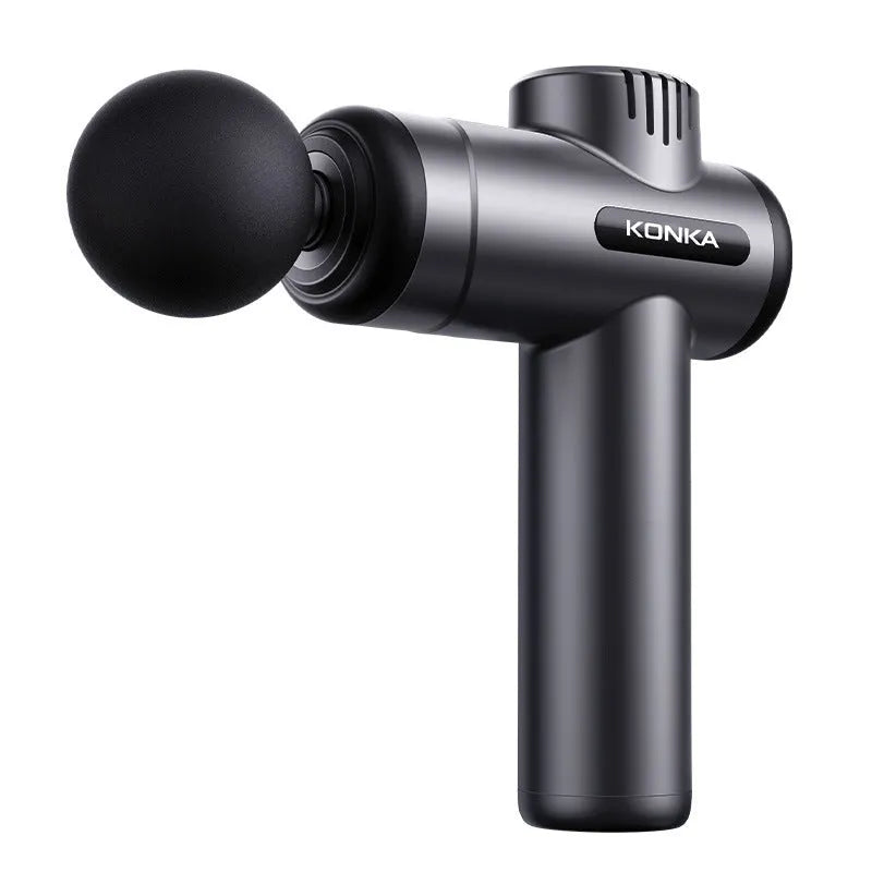 Konka V19 grey mini massage gun with multiple attachment heads on a table