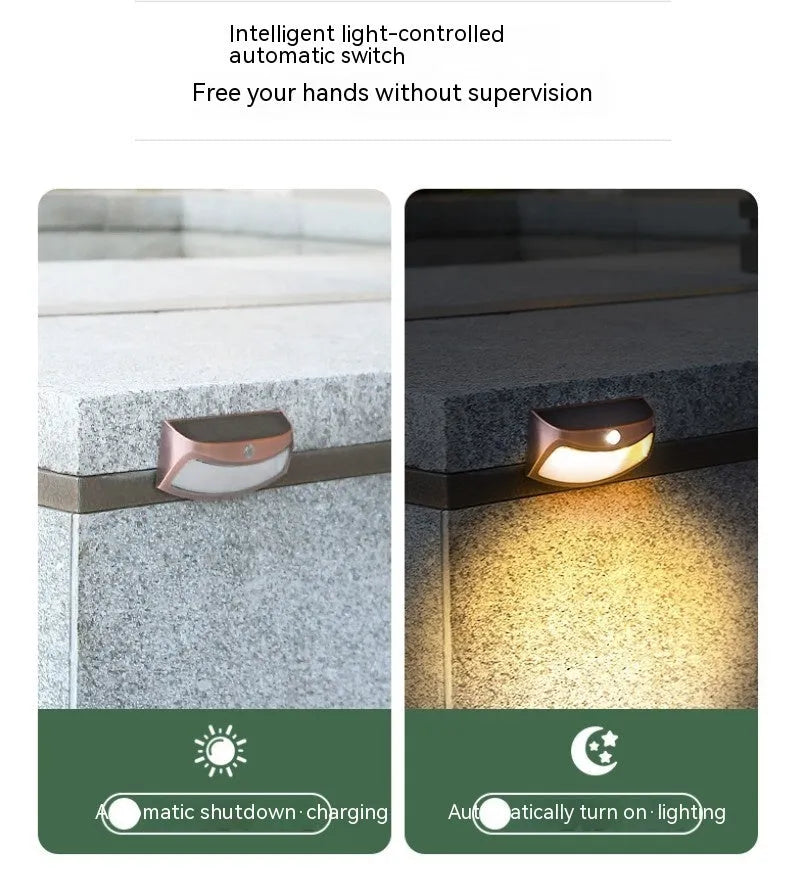 Solar powered outdoor wall lamp with smiling face design for garden and courtyard lighting