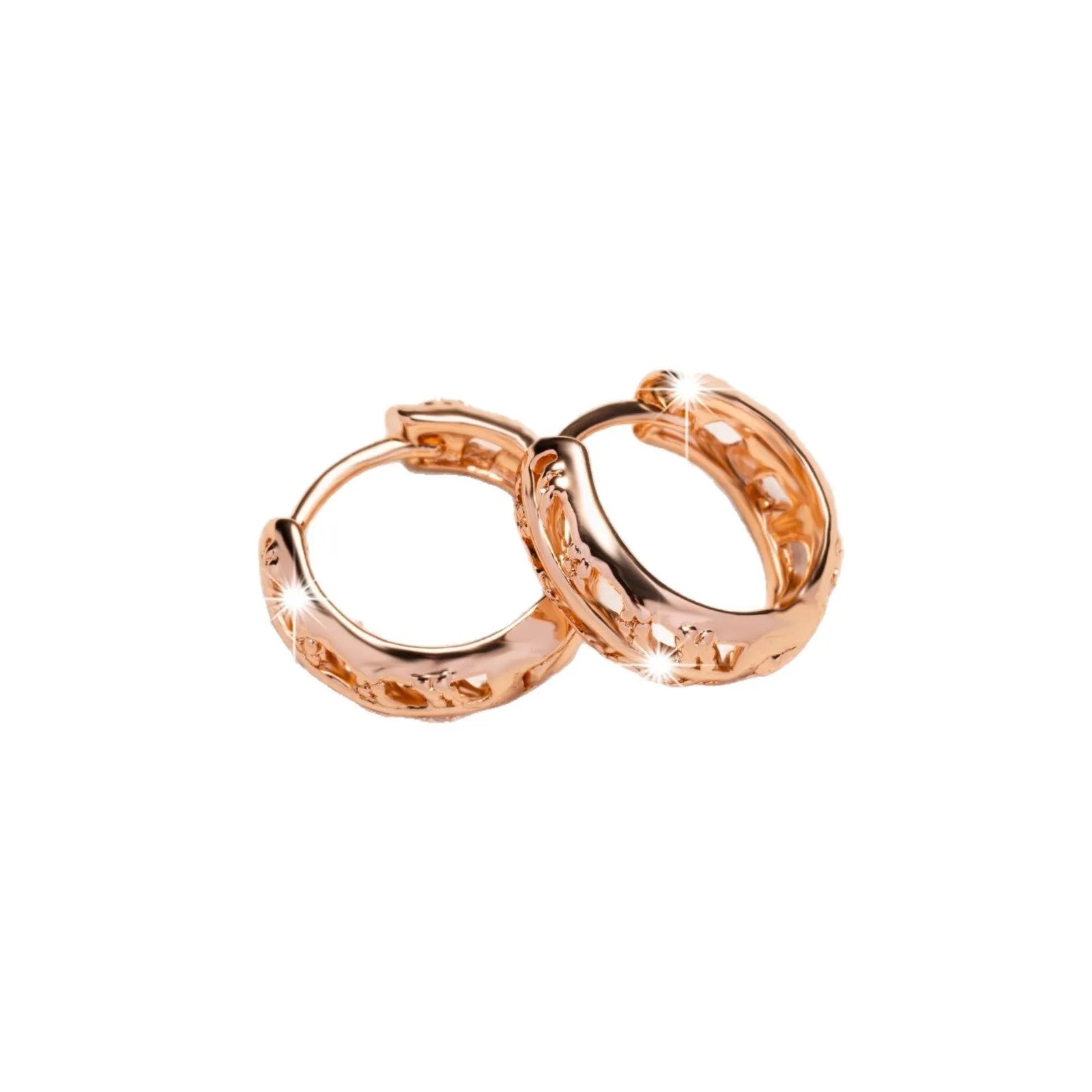 Rose gold plated copper leaf earrings with hollowed out design and heart-shaped detail