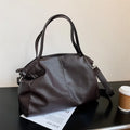 Large soft surface messenger bag with zip opening and adjustable shoulder strap in four colour options