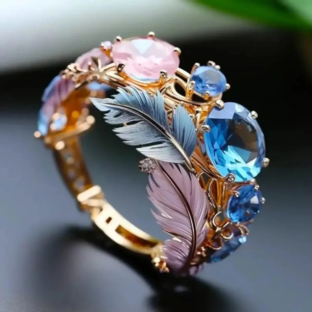 Gold brass zircon feather ring with embossed colourful pattern and geometric shape