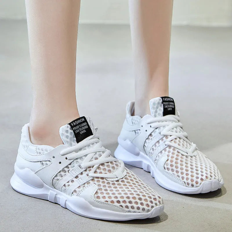 Low-top mesh sneaker with hollow breathable design and round toe in black and white colour options
