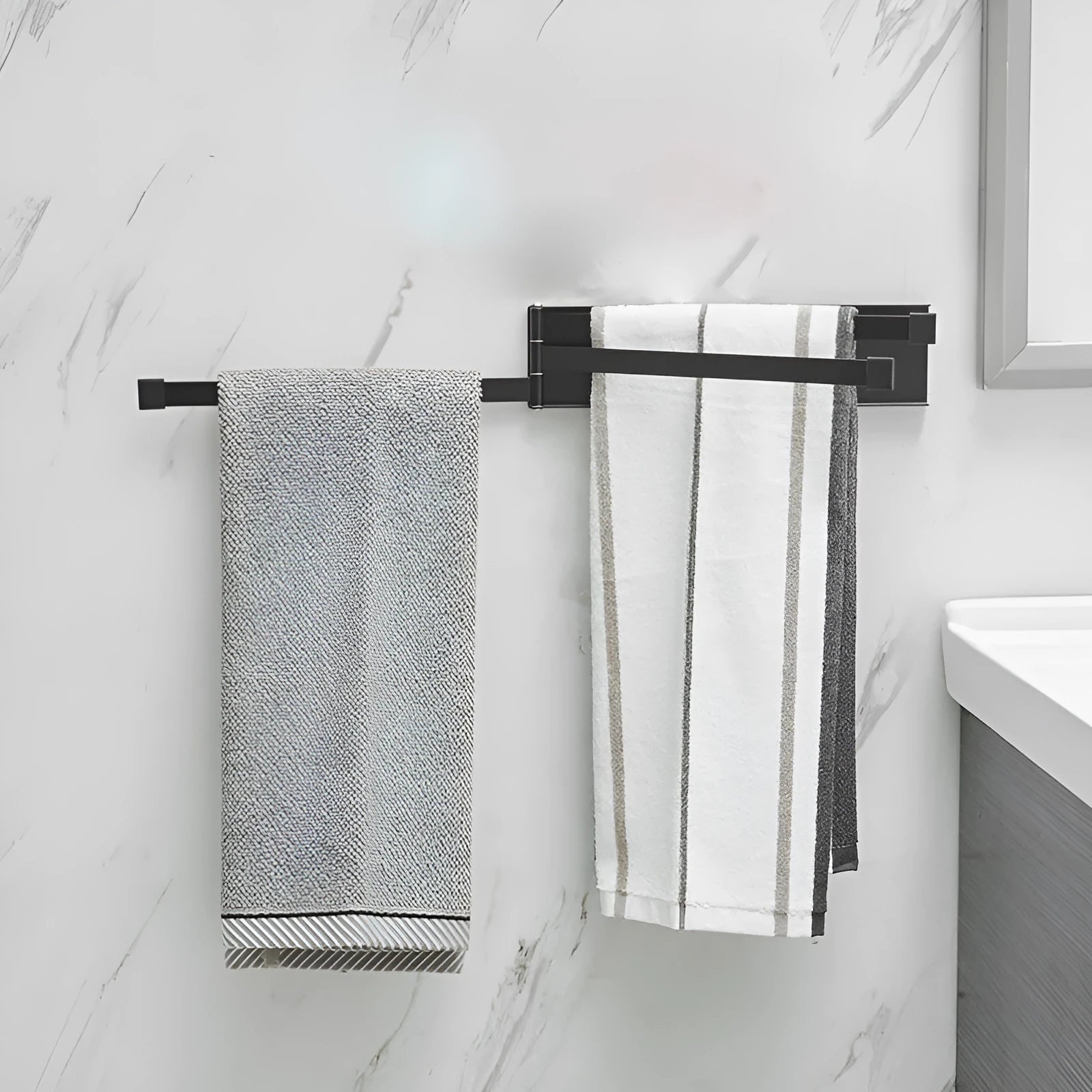 Black folding non-perforated towel bar on tiled bathroom wall, nail-free adhesive installation