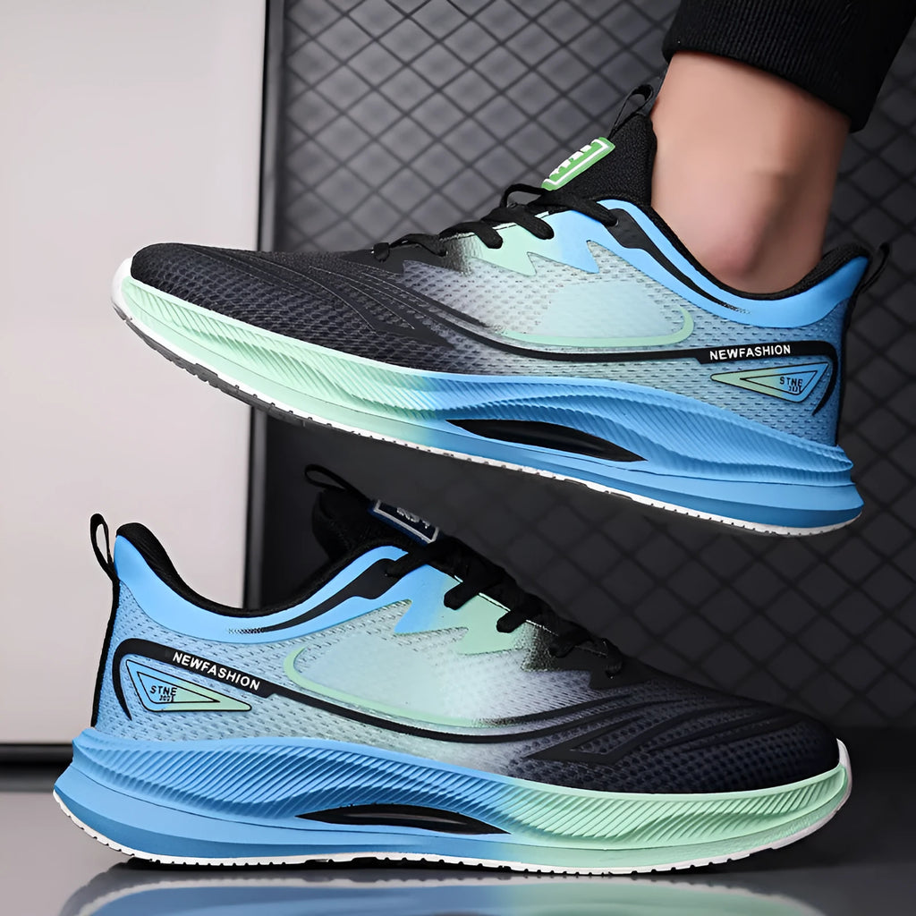 Men's low-top casual trainer in grey-green with woven mesh upper and round toe on a rubber sole.