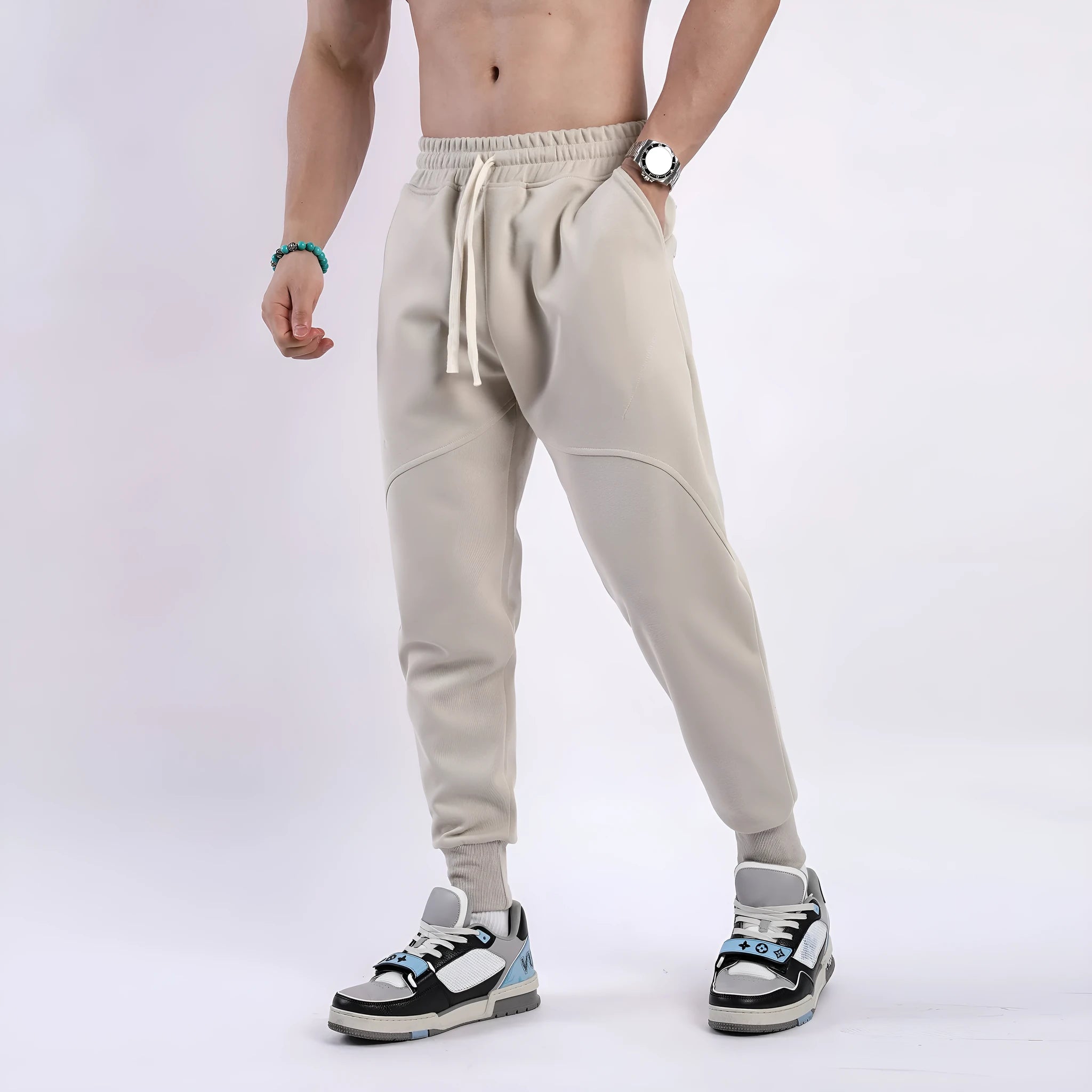 Men's casual ankle-tied drawstring sweatpants in polyester cotton elastic fabric, black colour