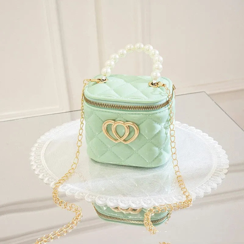 PVC bucket gel bag for women with heart pattern in choice of seven colours.