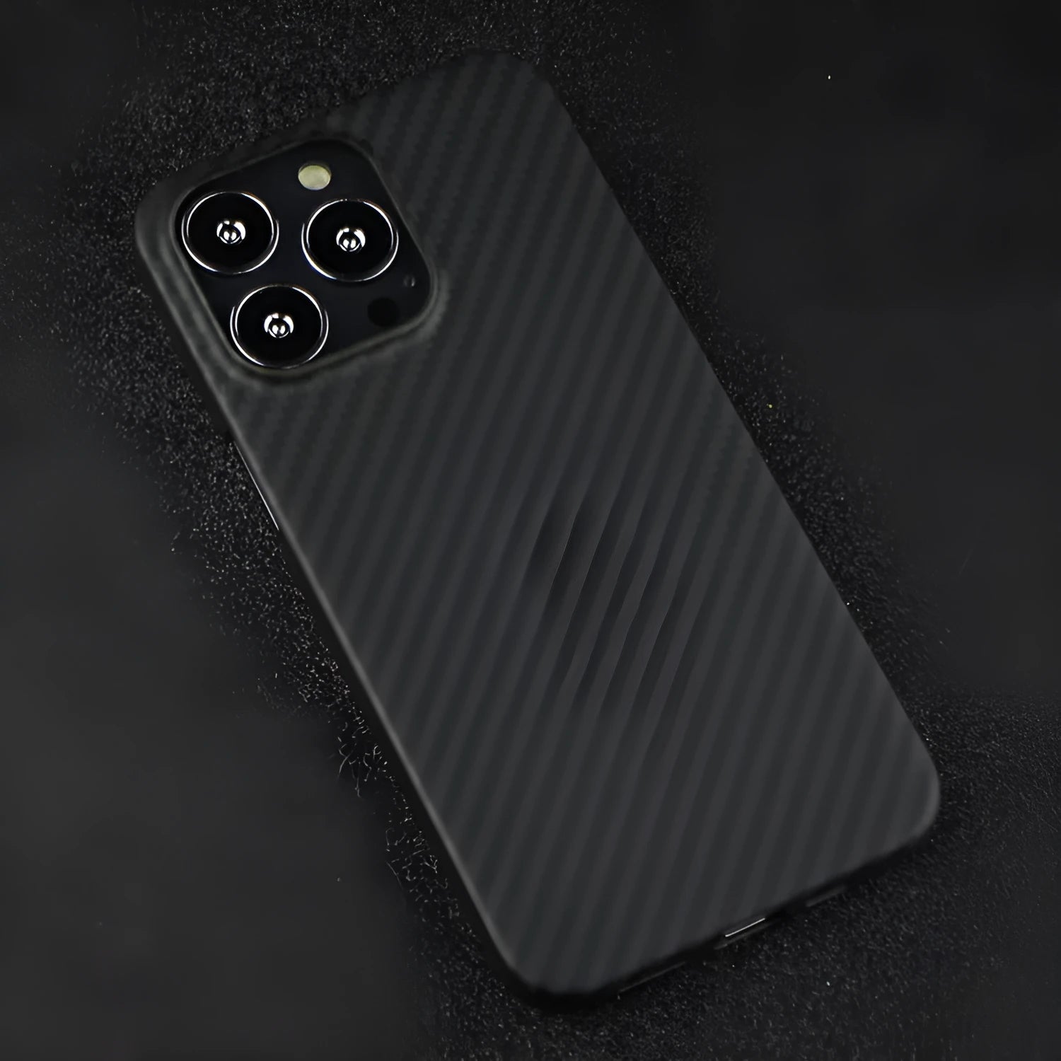 Kevlar fibre iPhone back cover with stripe pattern in dull black finish showing camera cutout