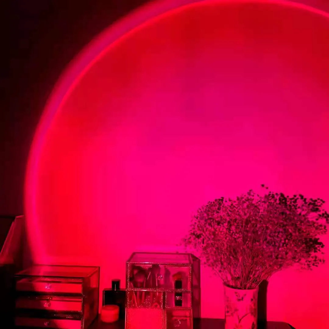USB rechargeable sunset projection lamp showing rainbow and sun colour patterns