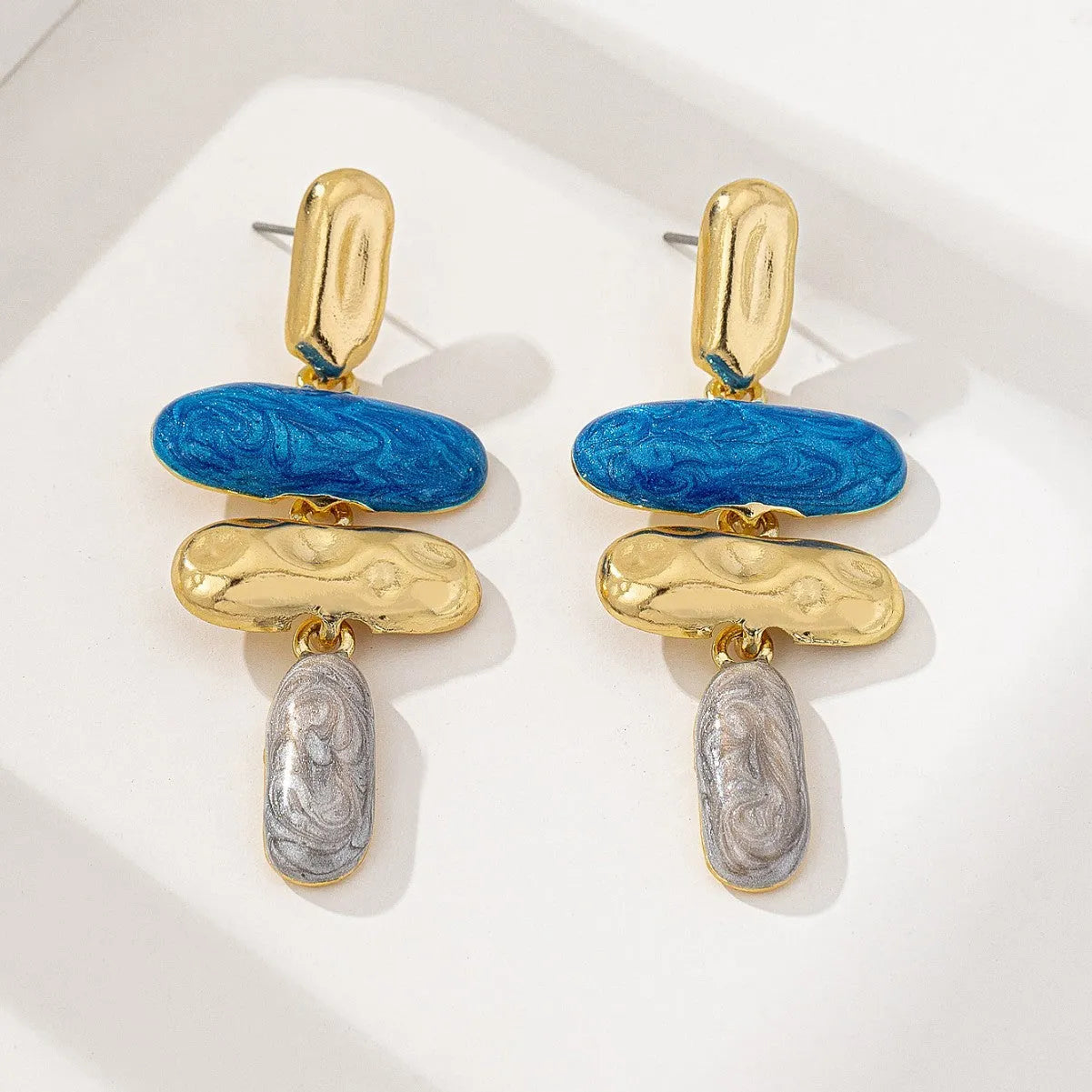 Women's geometric stud earrings with electroplated multicolour finish on zinc alloy