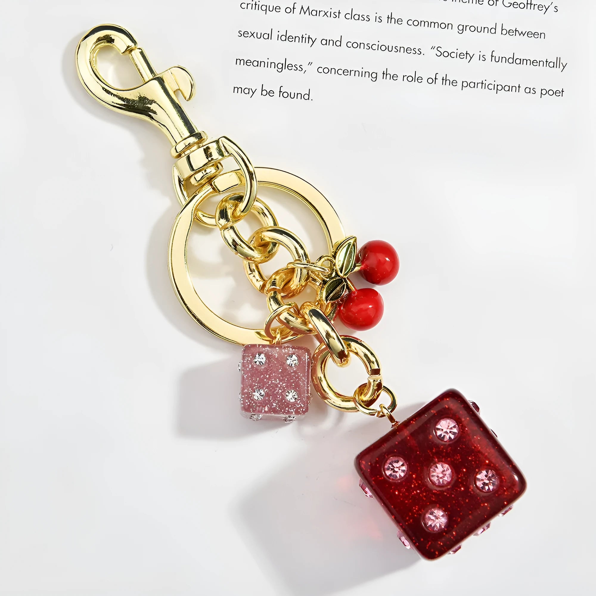 Square pattern metal keychain pendant with two-tone cherry dice design and electroplated finish
