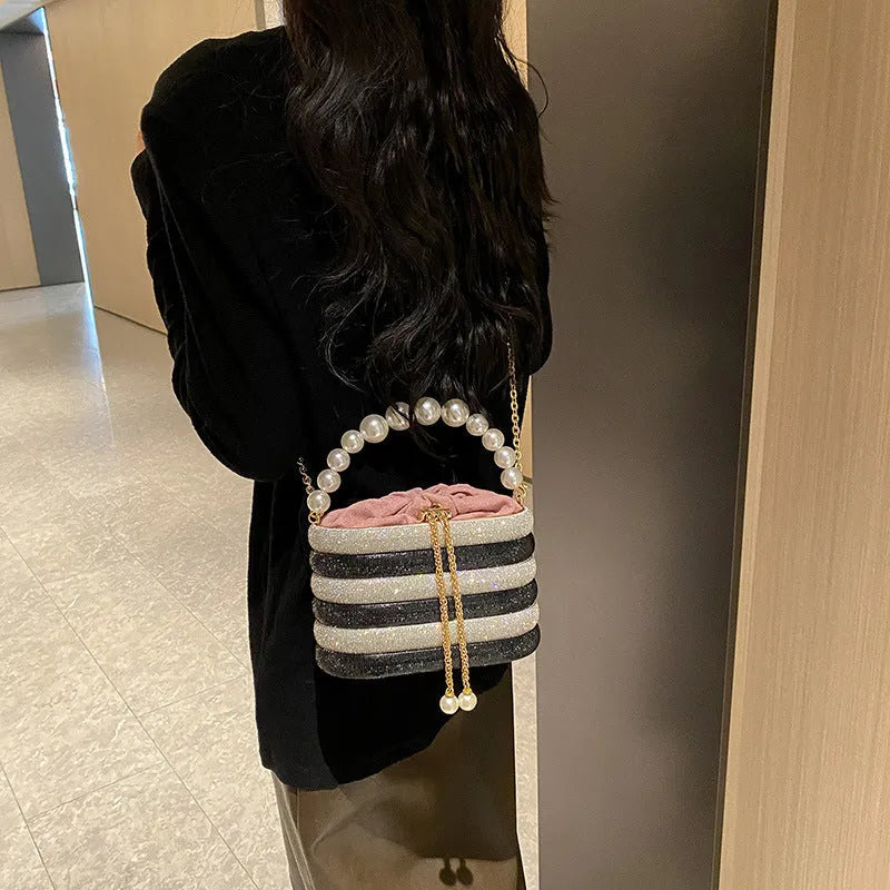 Round women's crossbody handbag with beaded pearl embellishments and European retro styling in multiple colour options