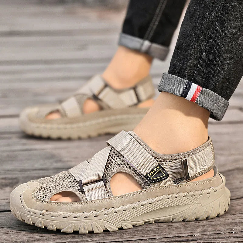 Men's summer casual sandals with hollow mesh surface, genuine leather upper, and elastic band in gray colour
