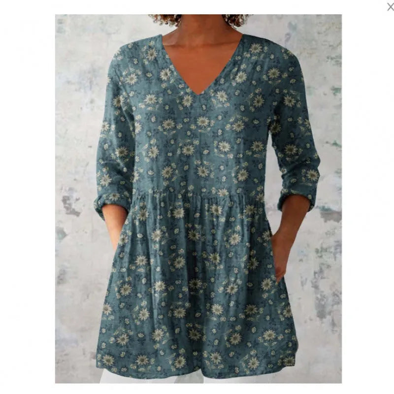 Women's printed loose dress with 3/4 sleeves and wide waist design in floral pattern