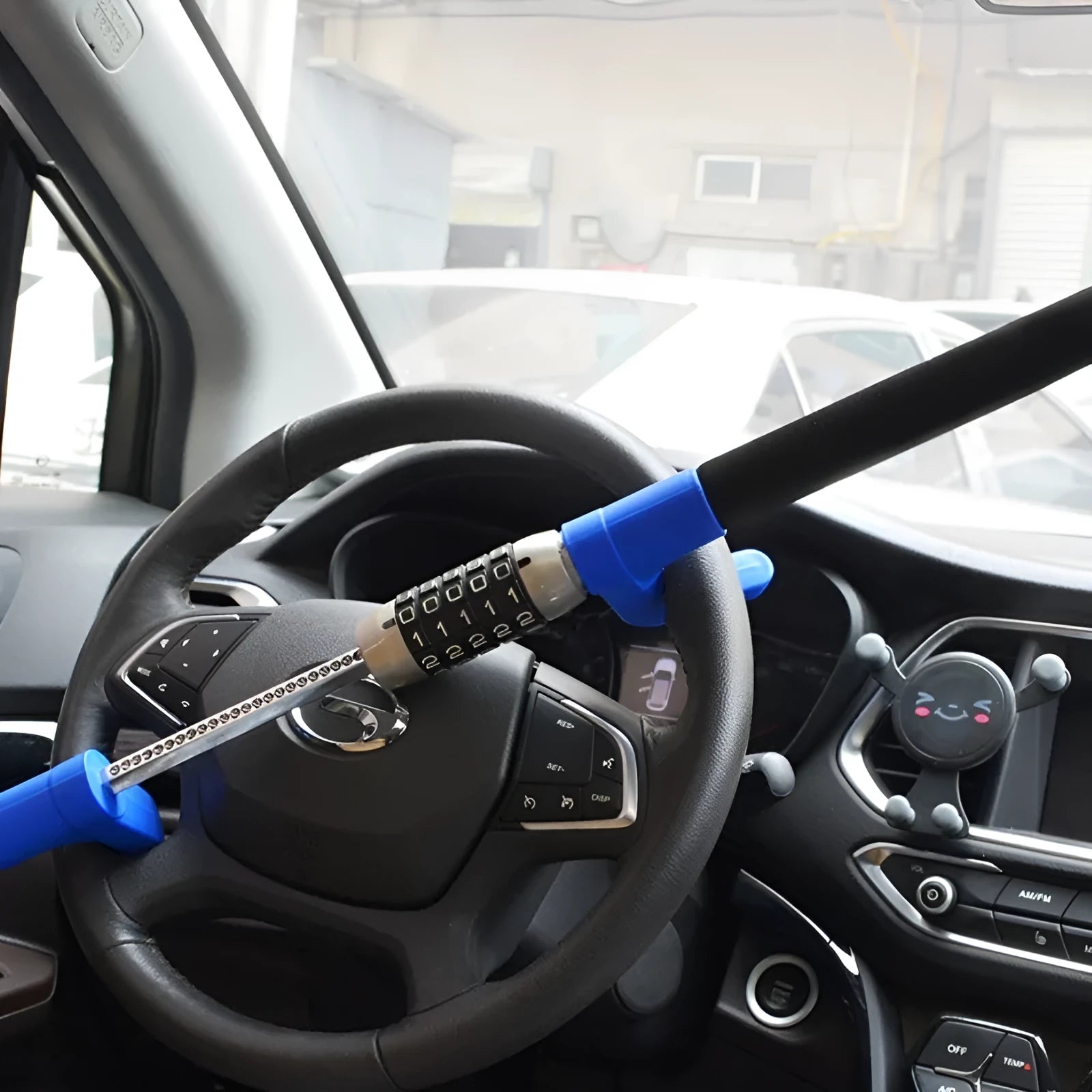 Car anti-theft password steering wheel U-lock in alloy steel, black colour, shown on a car steering wheel
