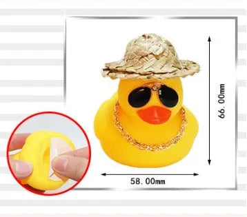 Yellow cartoon duck wearing a straw hat car dashboard ornament with adhesive and sunglasses accessory.