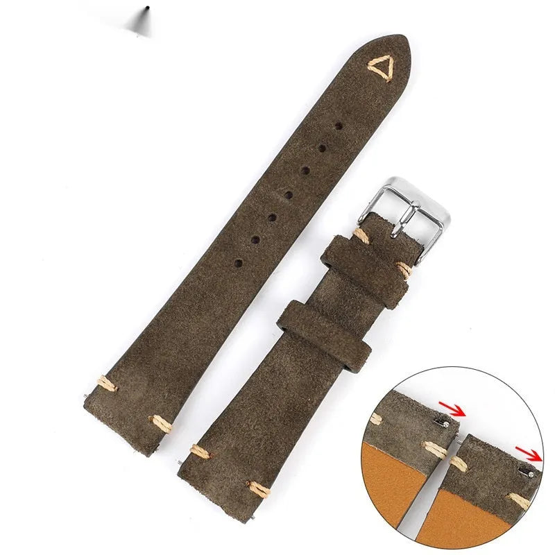 Brown genuine suede leather watch strap showing textured surface and buckle, laid flat.