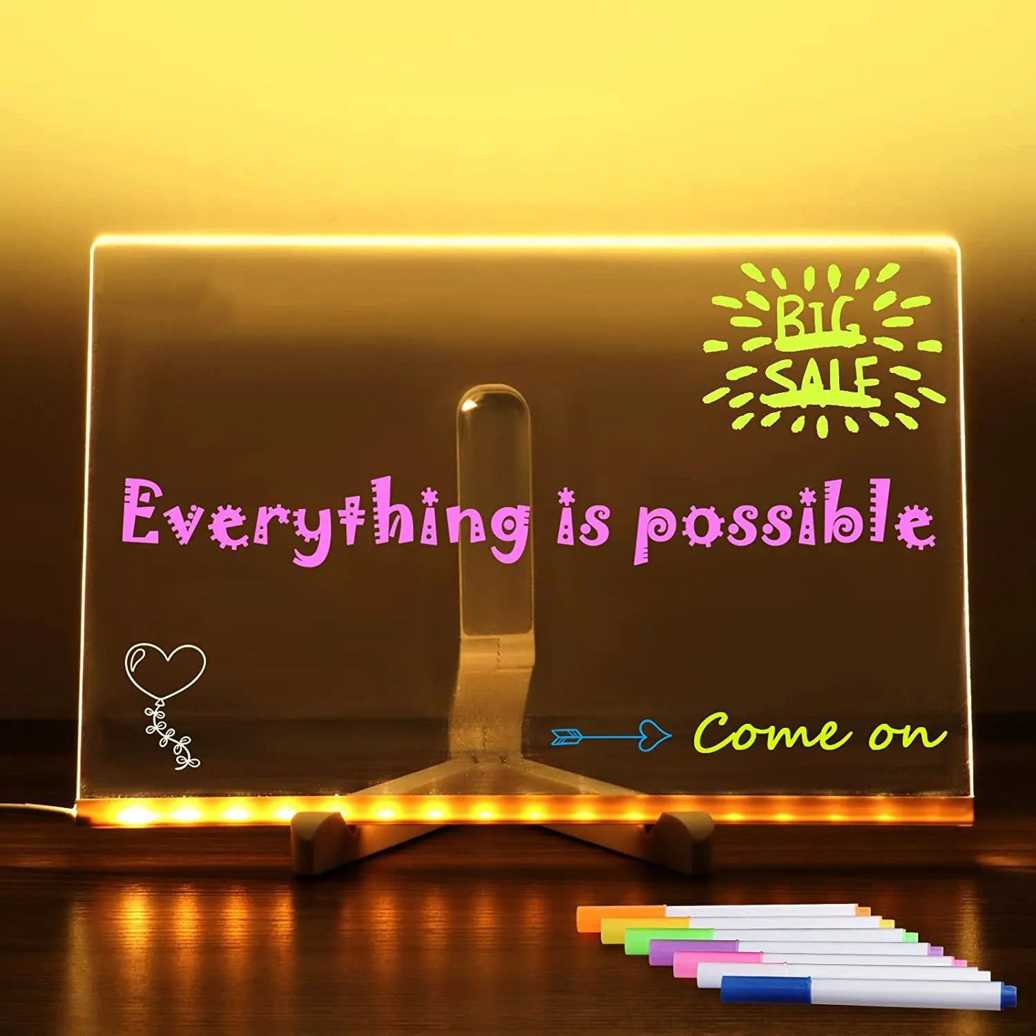 Acrylic DIY note board LED night light with pens on desk, showing written message and soft glow