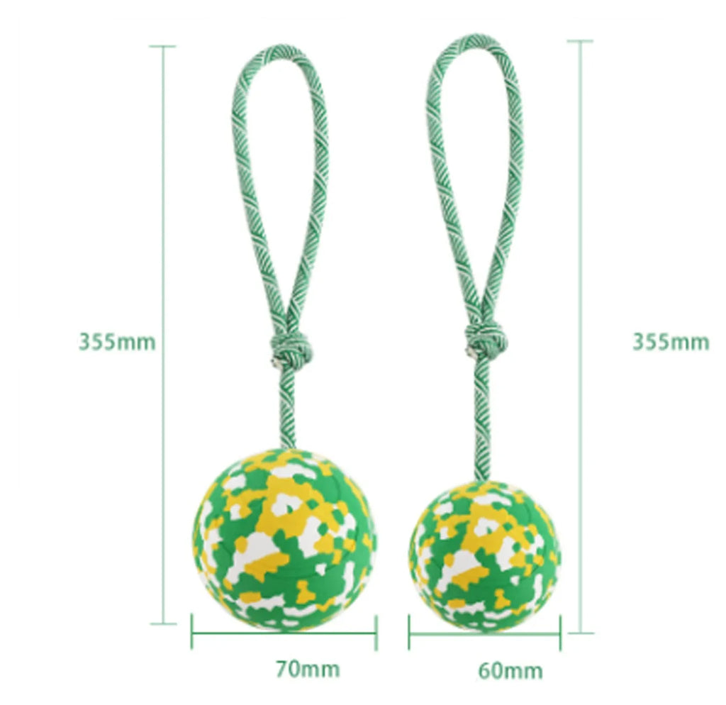 Natural rubber dog ball attached to nylon rope toy for medium and small dogs