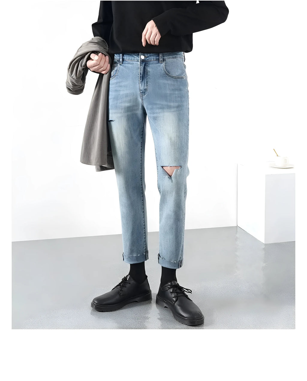 Men's light summer ripped jeans in blue with microelastic stretch denim, front view