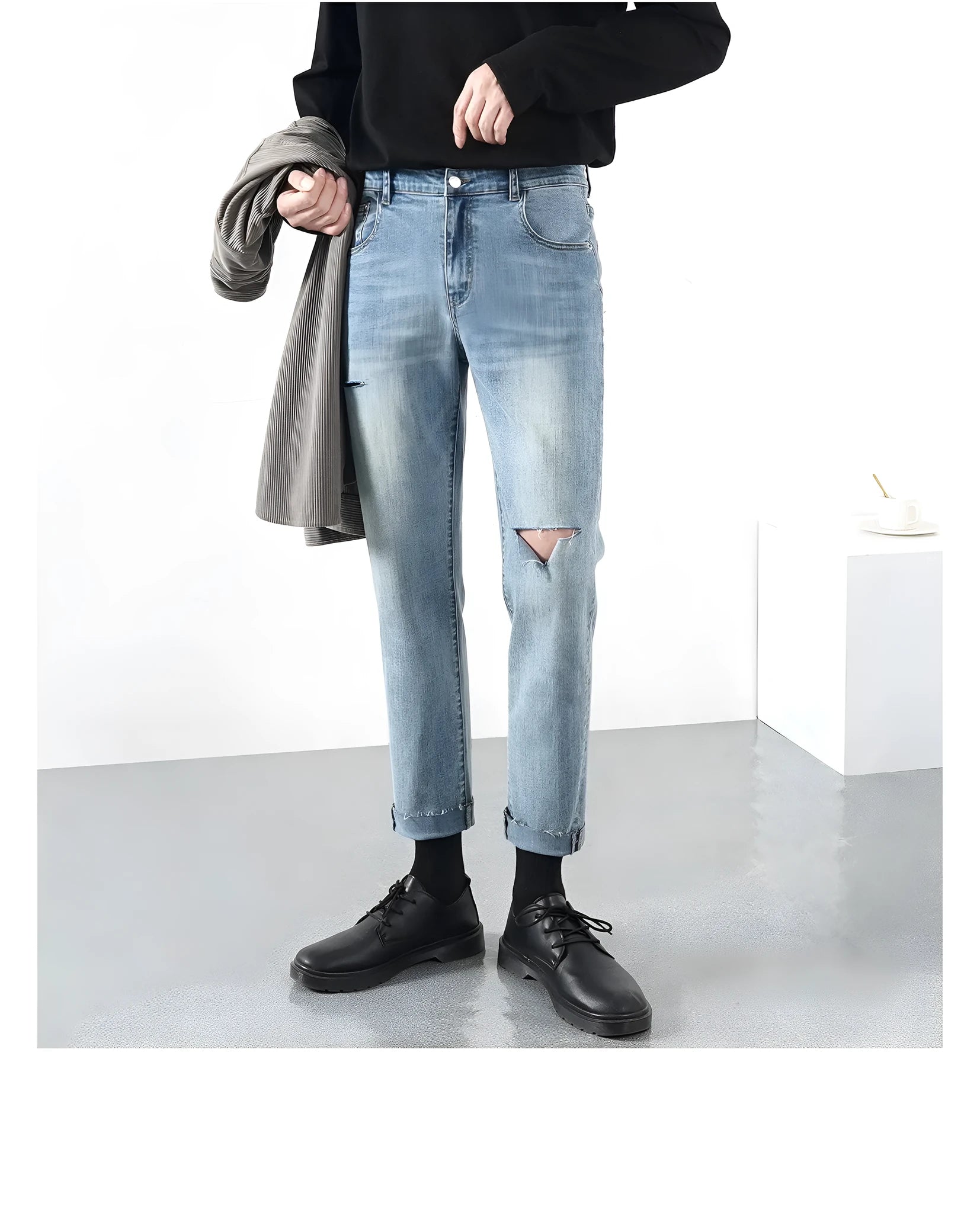 Men's light summer ripped jeans in blue with microelastic stretch denim, front view