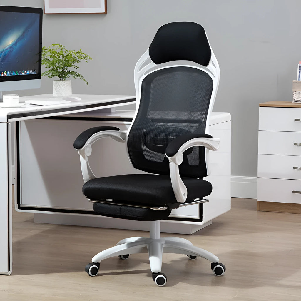 Ergonomic computer gaming chair in black with footrest and nylon wheels