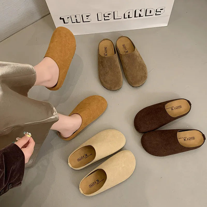 Pair of ugly soft flat Korean style slippers with square toe, shown in apricot colour.