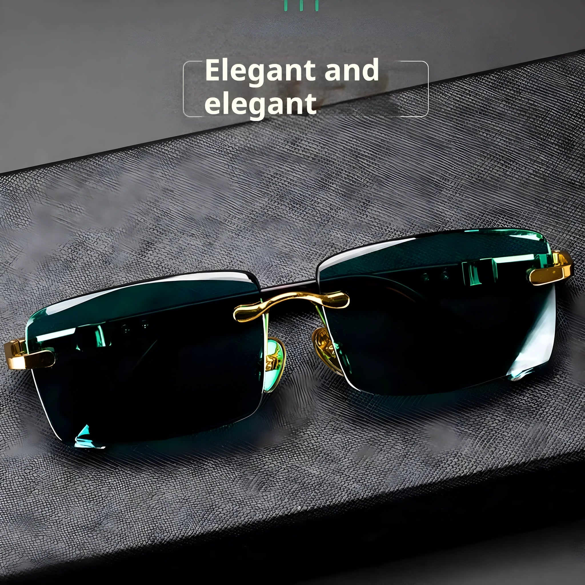 Dark green frameless crystal sunglasses with a distinctive design, shown with a hard case and lens cloth.