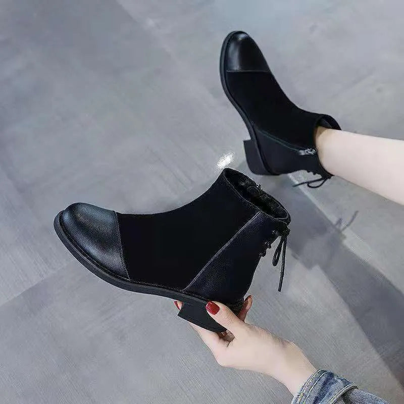 Black women's Martin boots with side zip, round toe, and short stout heel