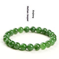 Natural Hetian jade and jasper bead bracelet showing polished spherical beads on a wrist.