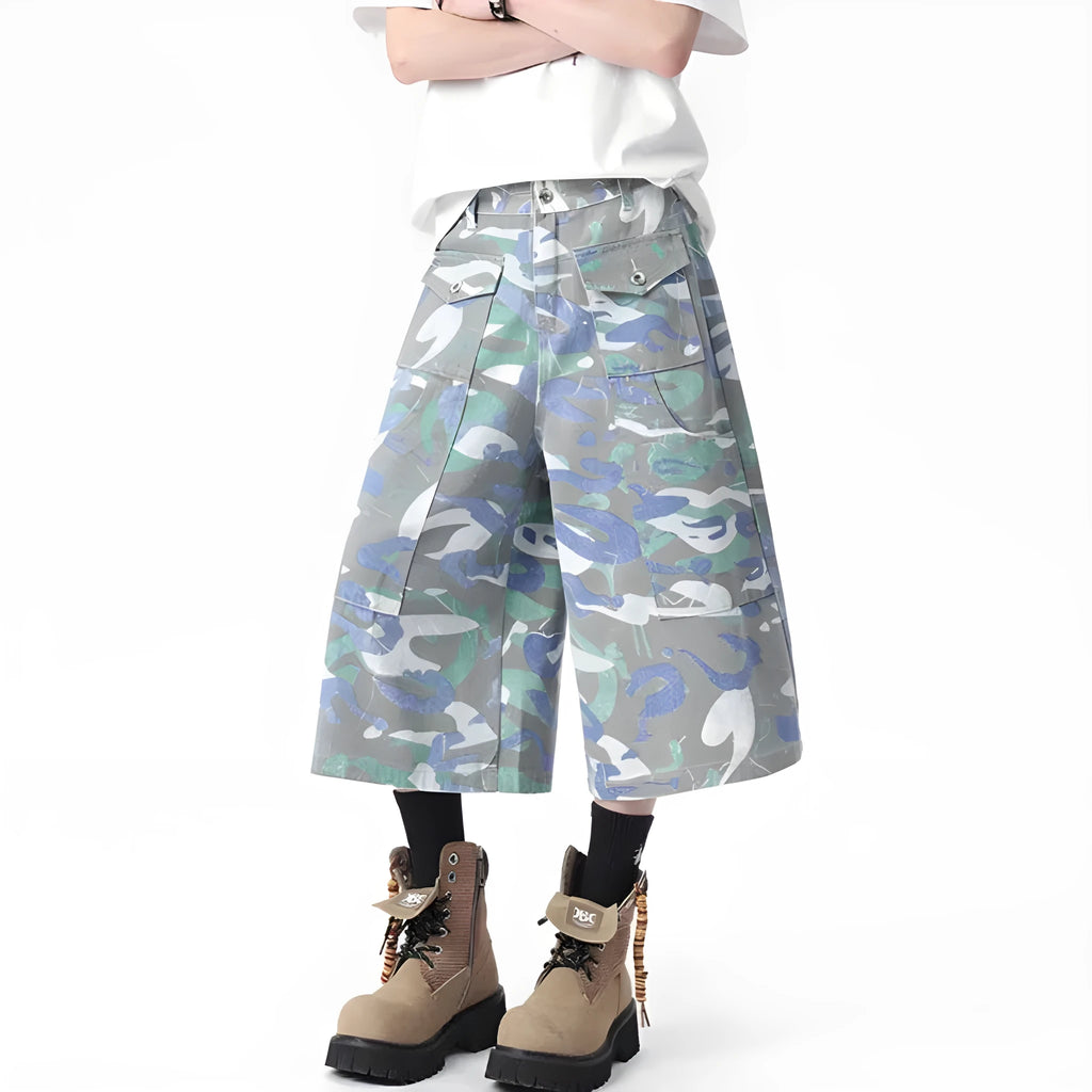 Men's camouflage cotton work trousers with straight leg and cropped length showing utility pockets