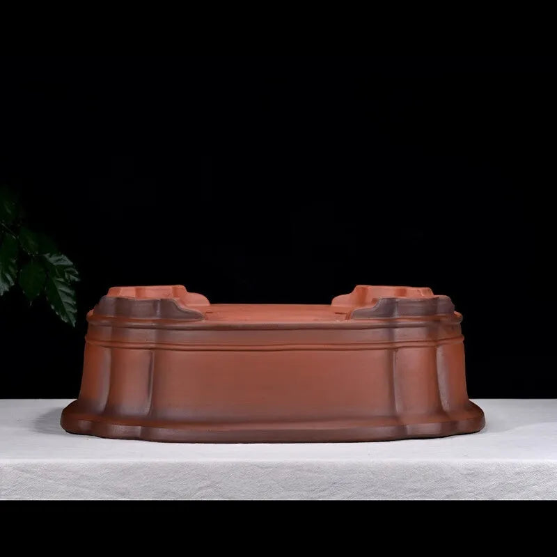 Large antique Chinese style purple clay flower pot with tree stump design and decorative botanical relief