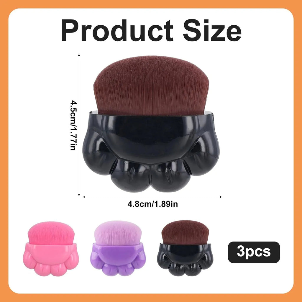 Three dog paw balm brushes with soft fibre heads and paw-shaped plastic handles, each in a small clear storage box