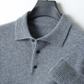 Men's grey wool pullover sweater with a polo collar laid flat