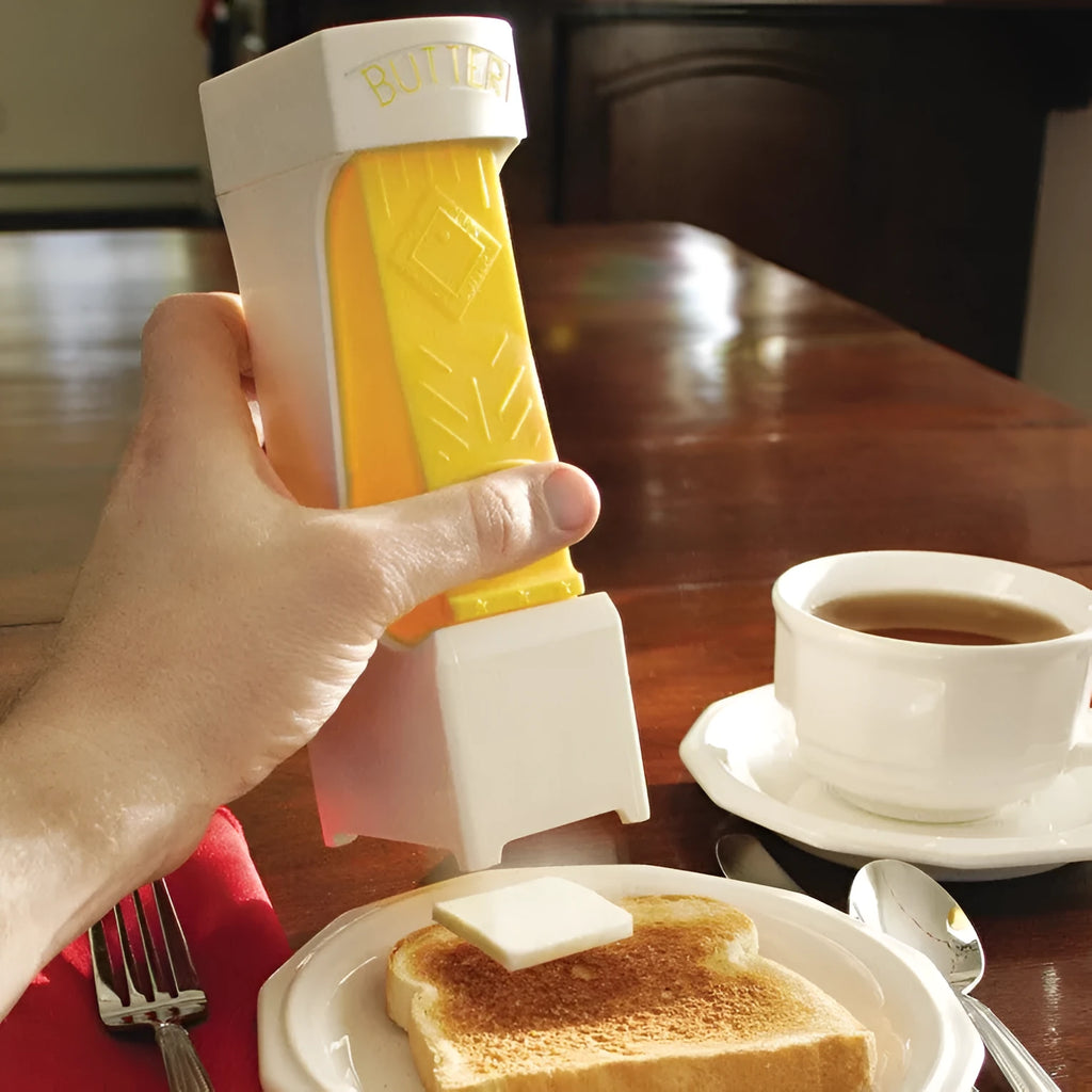 Yellow stick butter cutter cheese slicer one-button dispenser with ABS body and stainless blades on white background