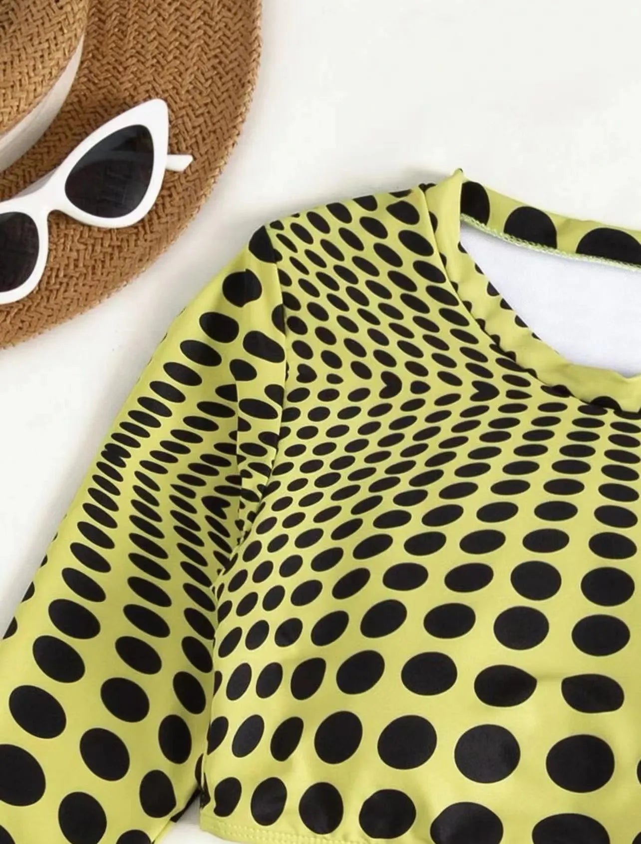 Women's polka dot swimsuit three-piece set in green, including top, skirt, and bra, made of polyester.