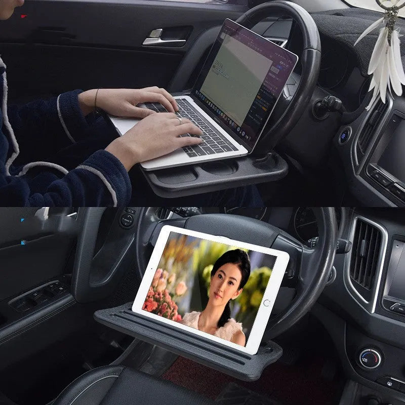Black plastic car computer desk and dining tray measuring 42 x 28cm on a car seat
