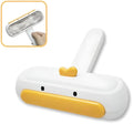 Yellow duck cartoon-style portable pet hair remover with plastic body and bristles.